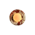 Elegant Red Marble Wall Sconce with Soft Ambient Lighting for Cozy Atmosphere
