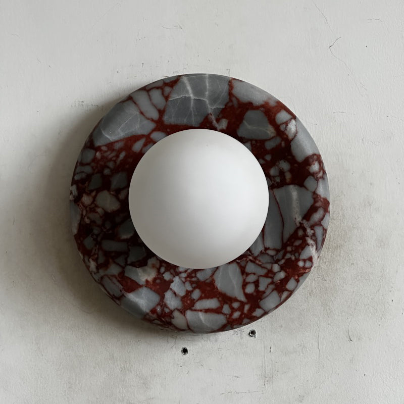 Elegant Red Marble Wall Sconce with Soft Ambient Lighting for Cozy Atmosphere