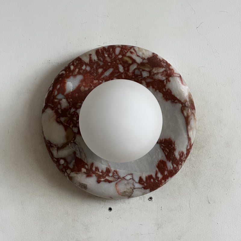 Elegant Red Marble Wall Sconce with Soft Ambient Lighting for Cozy Atmosphere