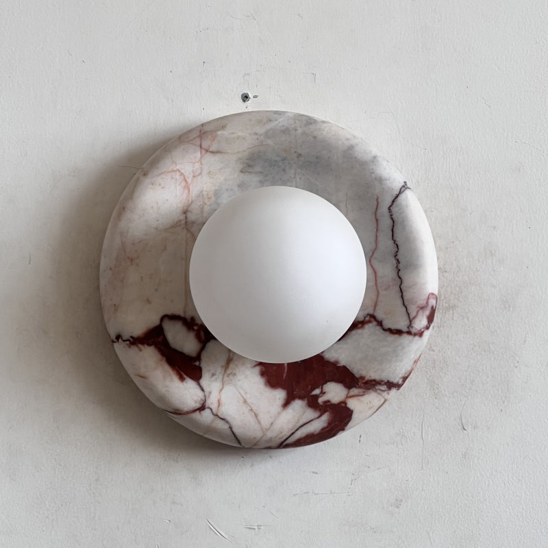 Elegant Red Marble Wall Sconce with Soft Ambient Lighting for Cozy Atmosphere