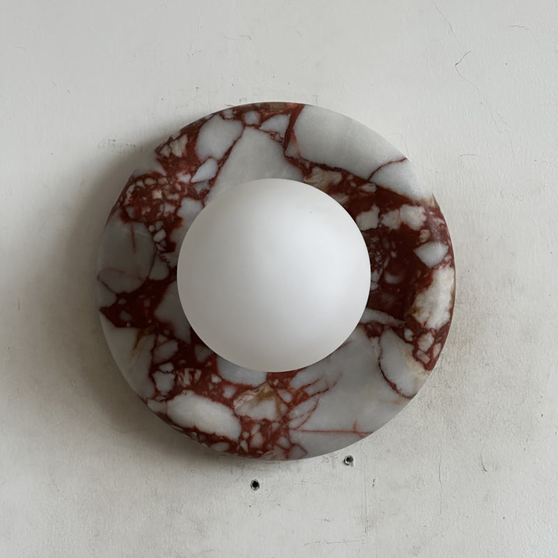 Elegant Red Marble Wall Sconce with Soft Ambient Lighting for Cozy Atmosphere