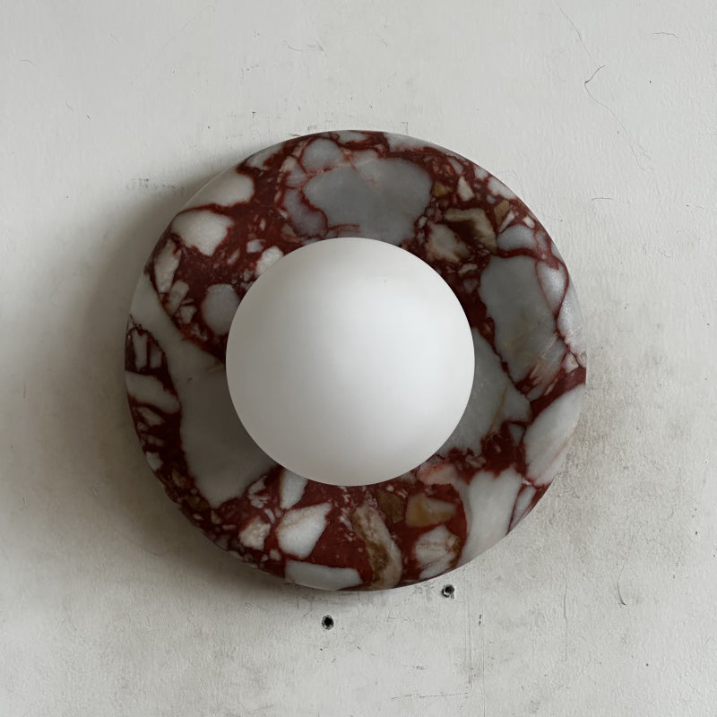 Elegant Red Marble Wall Sconce with Soft Ambient Lighting for Cozy Atmosphere