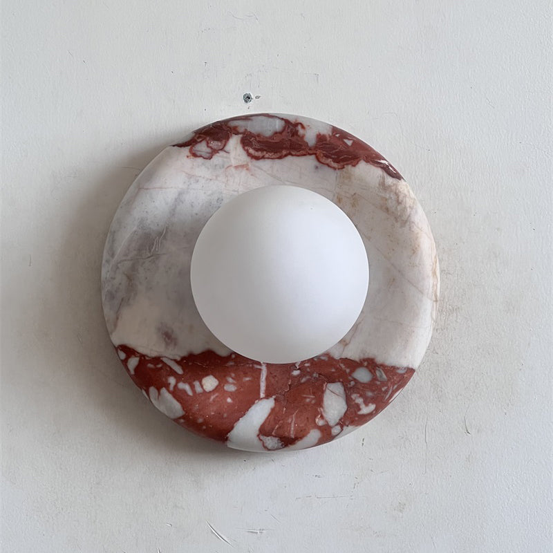 Elegant Red Marble Wall Sconce with Soft Ambient Lighting for Cozy Atmosphere