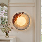 Elegant Red Marble Wall Sconce with Soft Ambient Lighting for Cozy Atmosphere